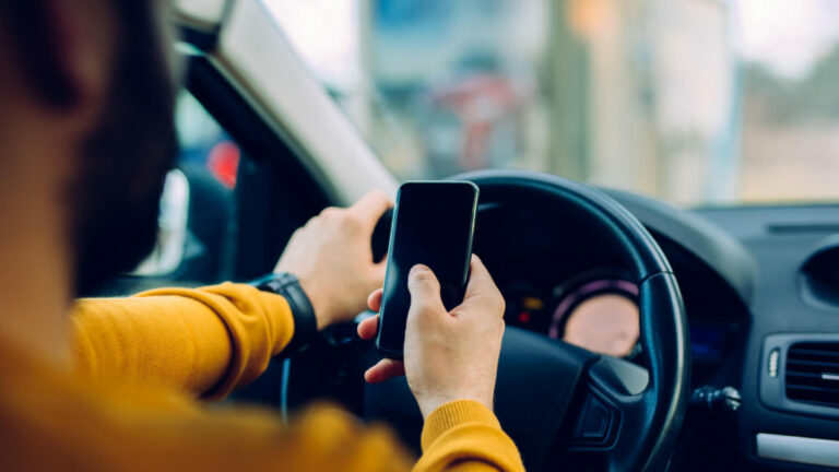 Using Mobile Phones While Driving in UK